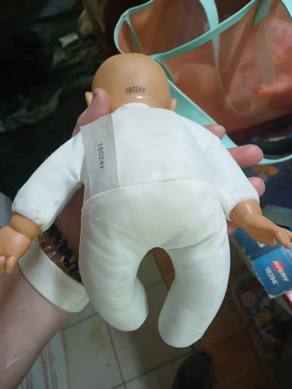 Uneeda baby doll with a soft cloth body and vinyl limbs